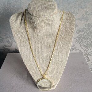 Gold Tone Magnifying Glass Necklace